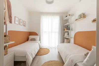 Letto o letti in una camera di Vibra Larimar