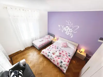 Letto o letti in una camera di GuestHost - Casa Barbara near Venice free park