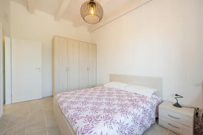 Letto o letti in una camera di Wave Island Torre B23
