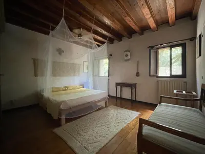 Letto o letti in una camera di La Bicocca