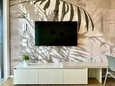 TV o dispositivi per l'intrattenimento presso Sun Village-Nuovissimo Appartamento in Residence con piscina -Lido di Jesolo Piazza Aurora
