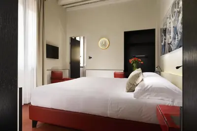 Letto o letti in una camera di Hotel L'Orologio Venezia - WTB Hotels