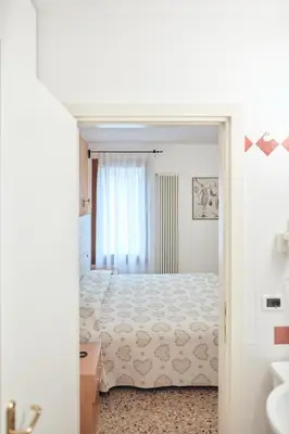 Letto o letti in una camera di Hotel Roma