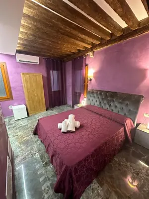 Letto o letti in una camera di Venice Rainbow Apartments BIENNALE