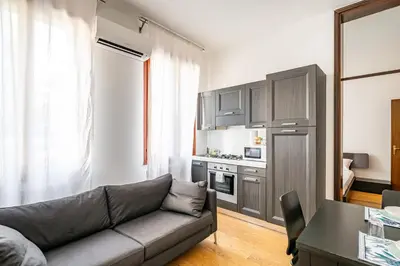 Cucina o angolo cottura di GuestHost - Padova Suite Isabella 500 meters from the Duomo!
