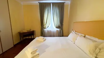 Letto o letti in una camera di Appartamento a cannaregio by Ca-Sa Check