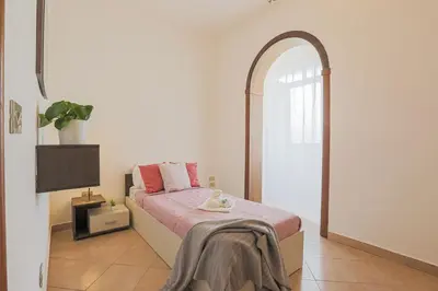 Letto o letti in una camera di LE BARCHE Guest House