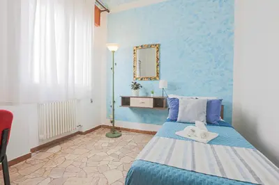 Letto o letti in una camera di LE BARCHE Guest House