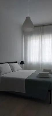 Letto o letti in una camera di Appartamenti Le Conchiglie Sottomarina