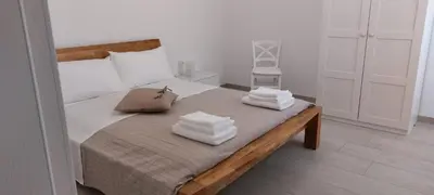 Letto o letti in una camera di Appartamenti Le Conchiglie Sottomarina