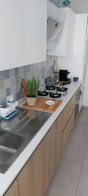 Cucina o angolo cottura di Appartamenti Le Conchiglie Sottomarina