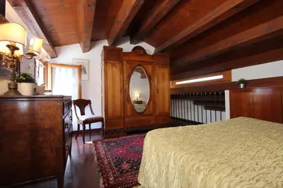 Letto o letti in una camera di Frari Prestige Canal View