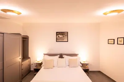 Letto o letti in una camera di Bassano Club House