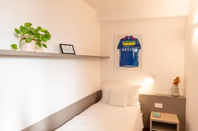 Letto o letti in una camera di Bassano Club House
