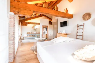 Letto o letti in una camera di Villa Giulia Relais & Spa
