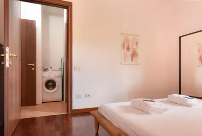 Letto o letti in una camera di Welc-ōM Padova alle Mura