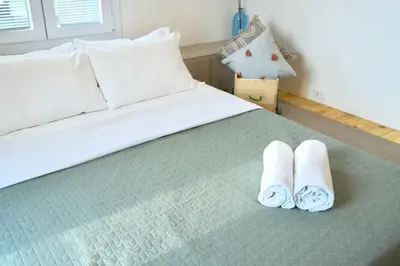 Letto o letti in una camera di Casa Semi 整套公寓