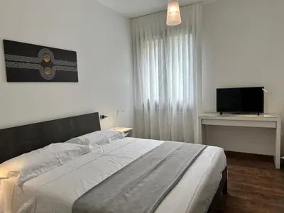 Letto o letti in una camera di All'ombra della magnolia