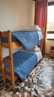 Letto o letti in una camera di Ostello di Vicenza