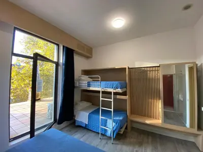 Letto o letti in una camera di Ostello di Vicenza