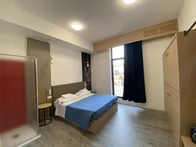 Letto o letti in una camera di Ostello di Vicenza