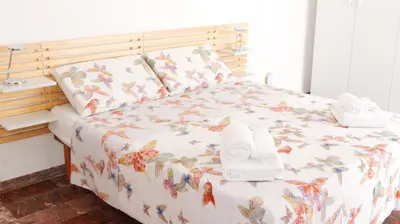 Letto o letti in una camera di Chez Regina, feel at home!