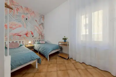 Letto o letti in una camera di Gate3-MarcoPoloAirport-3 camere da letto-Wifi-Netflix-15' from Venice