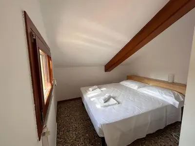 Letto o letti in una camera di Casa Murrina