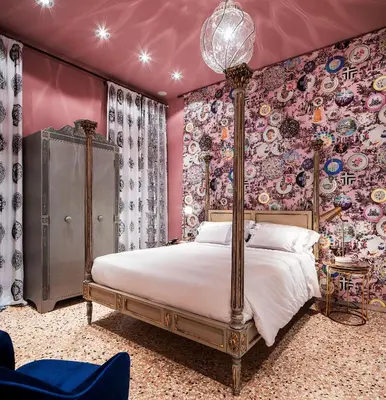Letto o letti in una camera di Hotel Heureka