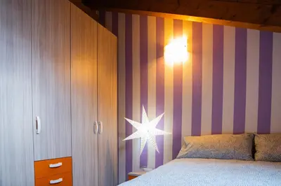 Letto o letti in una camera di 15 min dal centro - Moderno appartamento travato con parcheggio gratuito