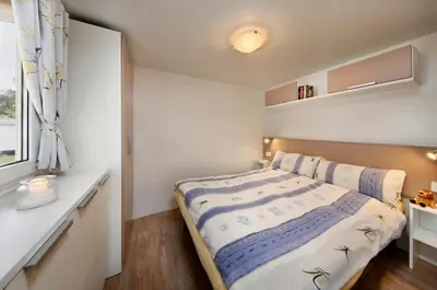 Letto o letti in una camera di Albatross Mobile Homes on Camping Ca'Savio