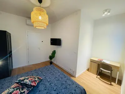 TV o dispositivi per l'intrattenimento presso Appart ristrutturato con 3 camere da letto, 2 bagni e Terrazza