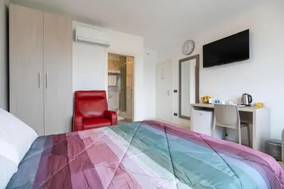 Letto o letti in una camera di Venice Friends Residence