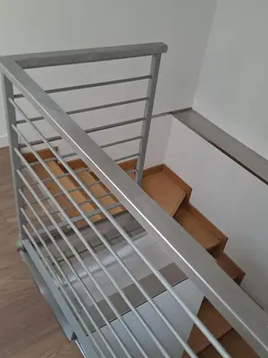 Letto o letti in una camera di LA MANSARDA
