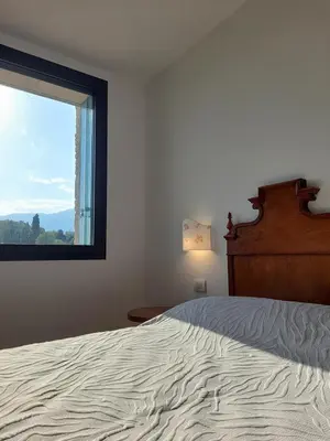 Letto o letti in una camera di Agriturismo Riva Beata - Podere Cunial appartamenti, produzione e degustazioni vini Asolo Prosecco DOCG