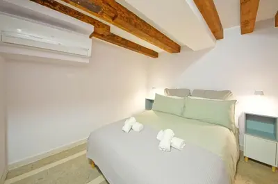 Letto o letti in una camera di DolceVita Apartments N 523