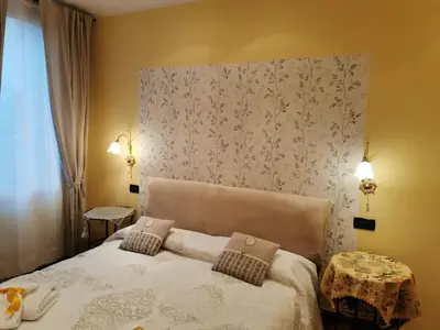 Letto o letti in una camera di Appartamento Ca' Marco Polo