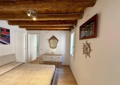 Letto o letti in una camera di Scorcio di Laguna - Vista laguna