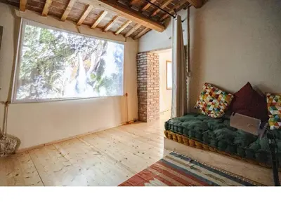 Area soggiorno di Appartamento con Spa Privata e vista falesia - La Perla a Lumignano