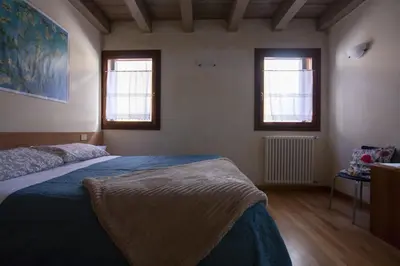Letto o letti in una camera di Venice Apartment