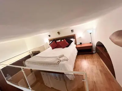 Letto o letti in una camera di CASA BRUVER Biennale Venezia - centro storico VENEZIA