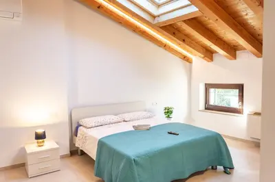 Letto o letti in una camera di Achillea