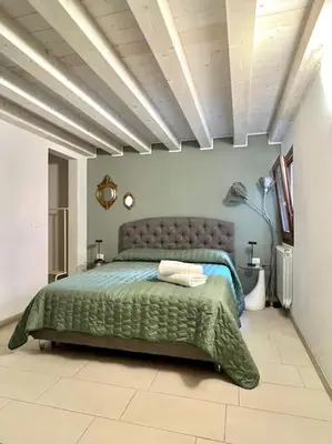 Letto o letti in una camera di Elena s Home piano primo