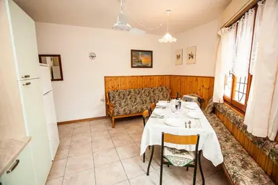 Area soggiorno di Quiet little villa by the seaside in Rosolina Mare