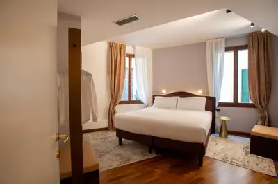 Letto o letti in una camera di Appartamento Veneziano