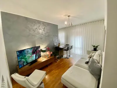 TV o dispositivi per l'intrattenimento presso Giuggiola Apartment