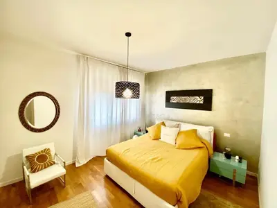 Letto o letti in una camera di Giuggiola Apartment