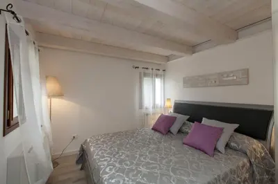 Letto o letti in una camera di Residenza Tiziano
