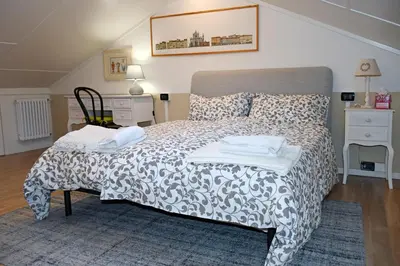 Letto o letti in una camera di Spazioso e lussuoso appartamento