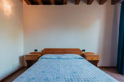 Letto o letti in una camera di Agriturismo P rato Fiorito